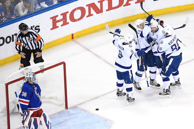 May 24, 2015; New York, NY, USA; Tampa Bay Lightning center Steven Stamkos (91) celebrates his goal with center Tyler Johnson (9), left wing Ondrej Palat (18) and right wing Nikita Kucherov (86)  against New York Rangers goalie Henrik Lundqvist (30) during the second period of game five of the Eastern Conference Final of the 2015 Stanley Cup Playoffs at Madison Square Garden. Mandatory Credit: Eric Hartline-USA TODAY Sports